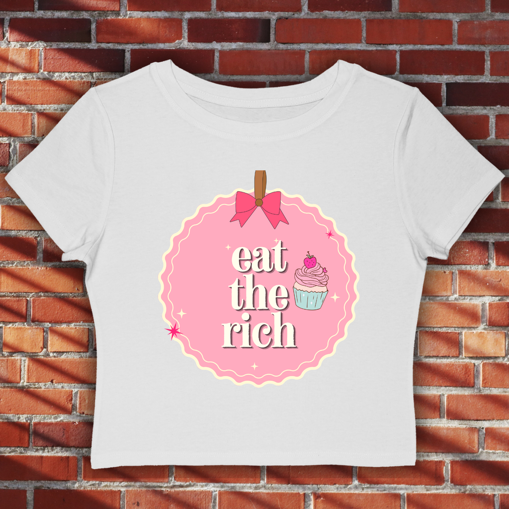 Eat the Rich Pink Coquette Cupcake Baby Tee — Women's Demure Graphic
